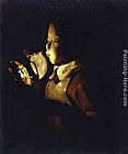 Georges De La Tour Canvas Paintings - Boy blowing at a Lamp